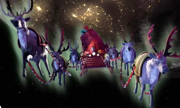 Santa's sleigh with lots of reindeer carrying it through the night sky, from show What Santa Sees.