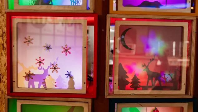 A selection of Christmas shadow boxes in the Tinkering Space in We The Curious. 
