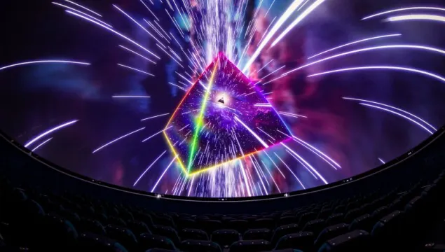 Promotional image of a dome screen showing Pink Floyd's Dark Side of the Moon Planetarium Show
