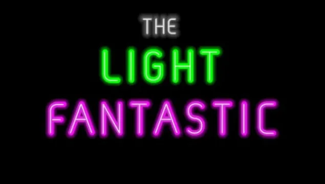 Neon sign saying "The Light Fantastic" on a black background