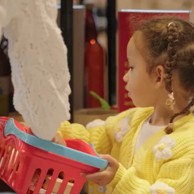 Our mock shop was suitable for all ages, like this tiny shopper.