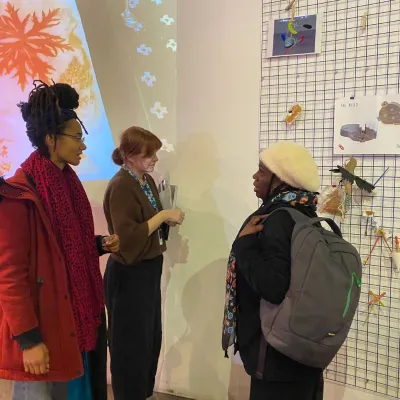 Getting some ideas from a wall display in We The Curious 