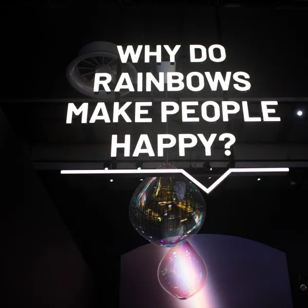 A text display that reads why do rainbows make people happy?