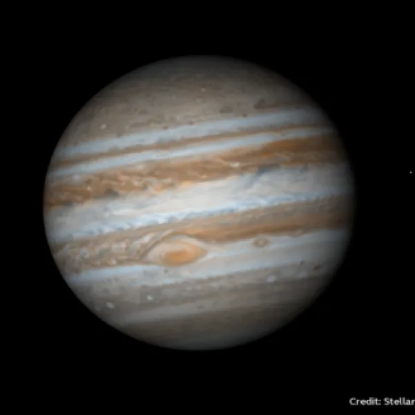 Photograph of Jupiter.  Coloured bands of gas and the great red spot visible.