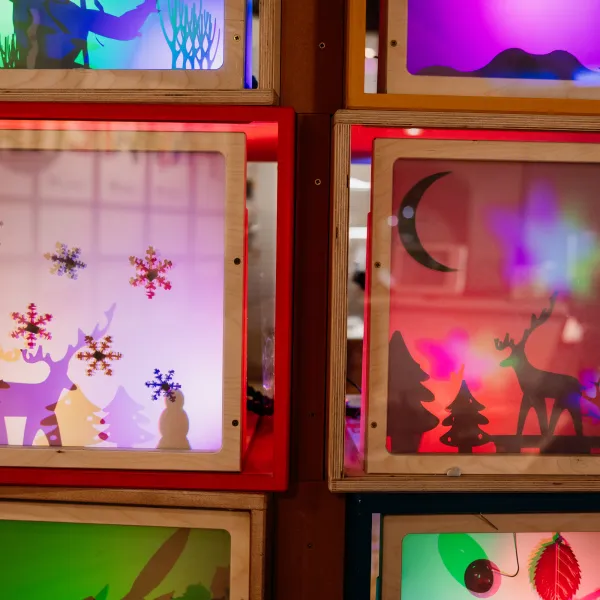 A selection of Christmas shadow boxes in the Tinkering Space in We The Curious. 