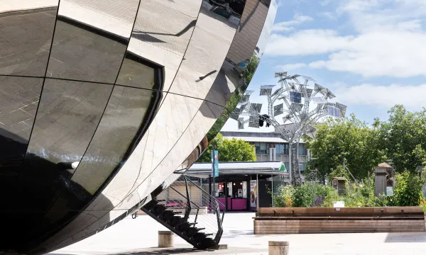 A giant reflective ball next to We The Curious on Millennium Square Bristol that houses UK's only 3D planetarium